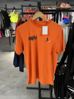 Franela running naranja.